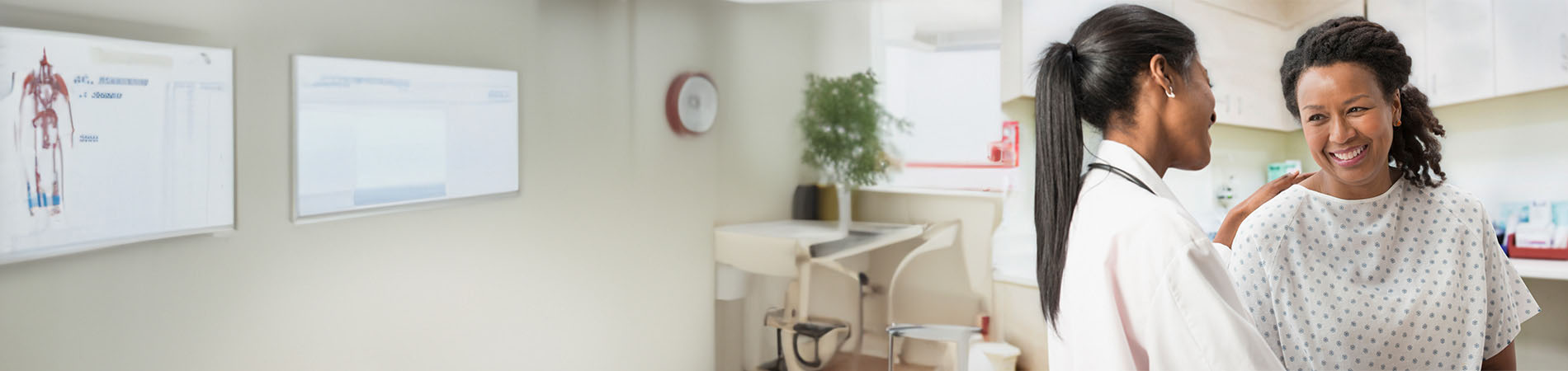 Woman doctor and woman patient at the office